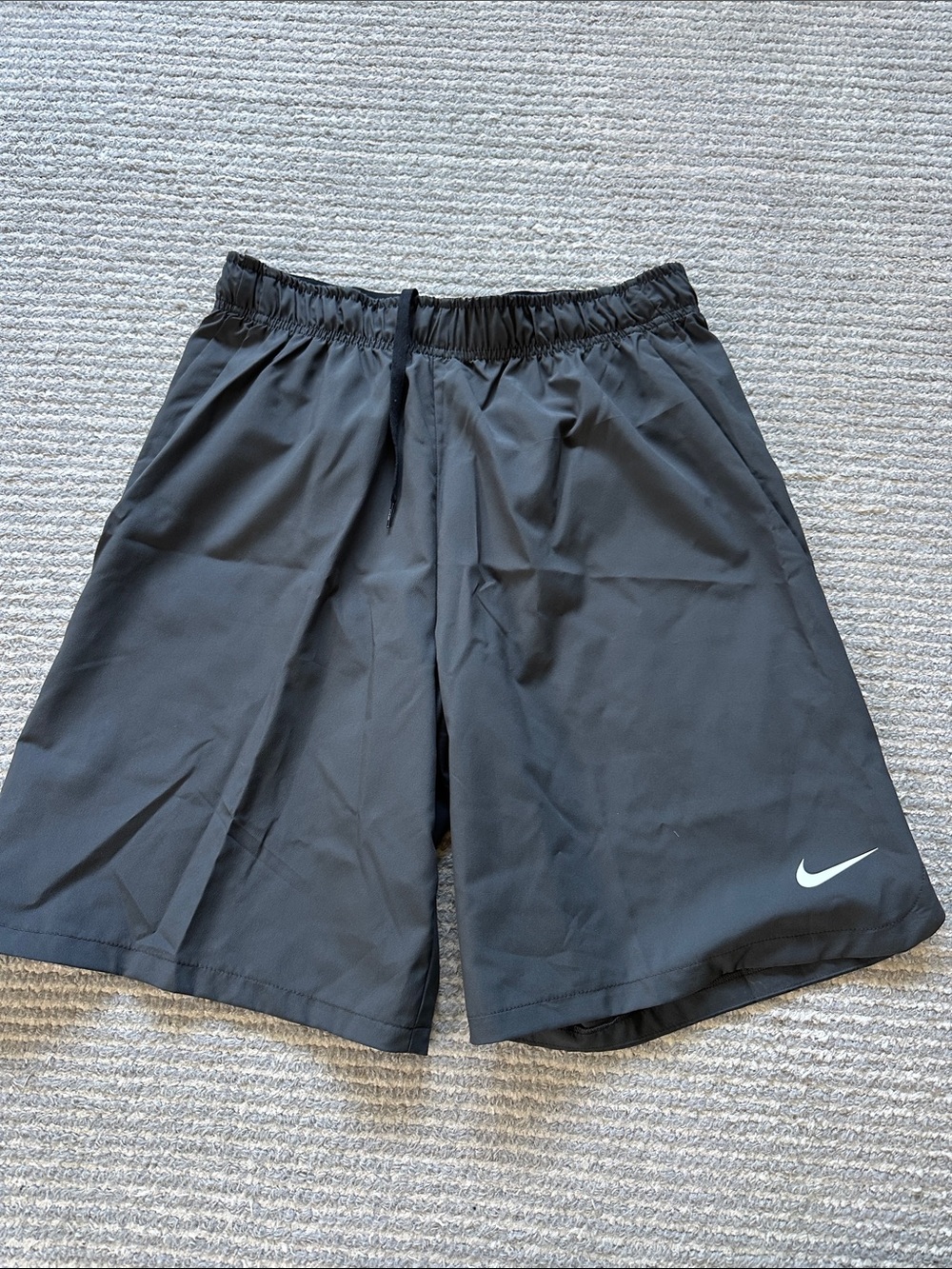 Nike Men's Black Athletic Shorts with White Swoosh